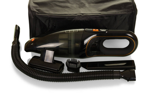 Portable vacuum cleaner with interchangeable nozzles 
