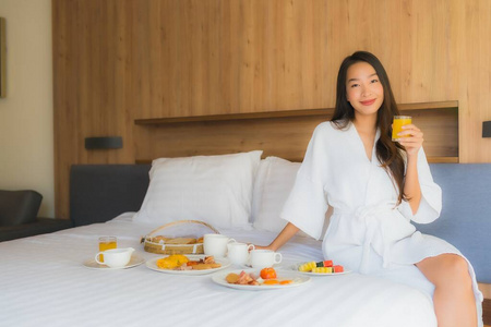 Portrait beautiful young asian woman happy enjoy with breakfast 