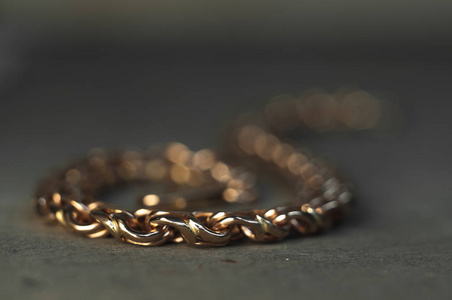  Closeup of unfinished bracelet on goldsmith table. Jewelry in 