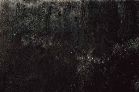 Grungy black wall background or texture 