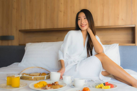 Portrait beautiful young asian woman happy enjoy with breakfast 