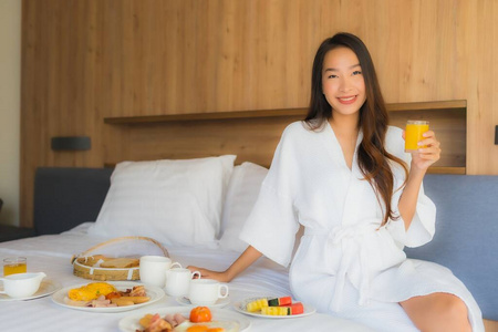 Portrait beautiful young asian woman happy enjoy with breakfast 