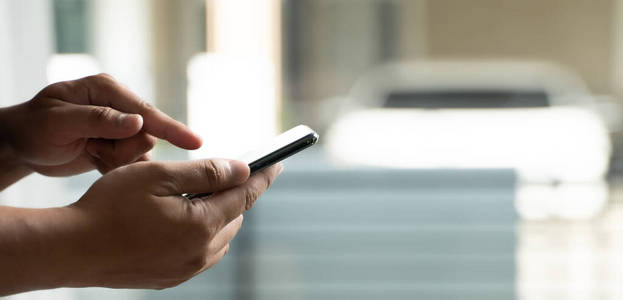 Man using smartphone using the phone for work everyday internet 