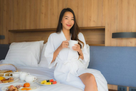 Portrait beautiful young asian woman happy enjoy with breakfast 