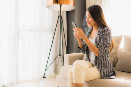 Portrait beautiful young asian women using talking mobile phone 