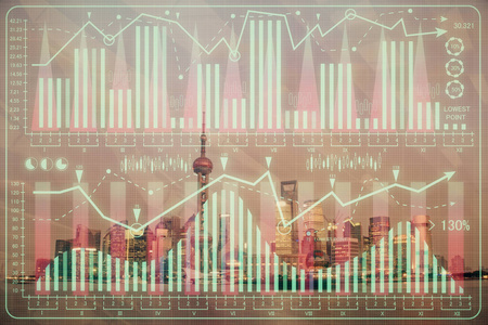 高楼背景多重曝光的城市景观外汇图表。金融研究概念。