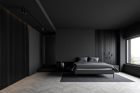 有一层铺有地毯的混凝土地板, 阁楼的窗户和床头桌的主床