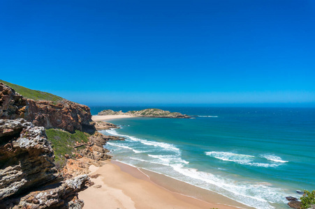 Summer beach nature background with ocean, sand shore. Beach hol