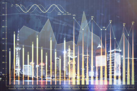 金融图形夜市景观与高楼背景双重曝光。分析概念。