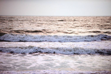 海滩 日落 旅游业 天气 地平线 波浪 海岸 自然 美丽的