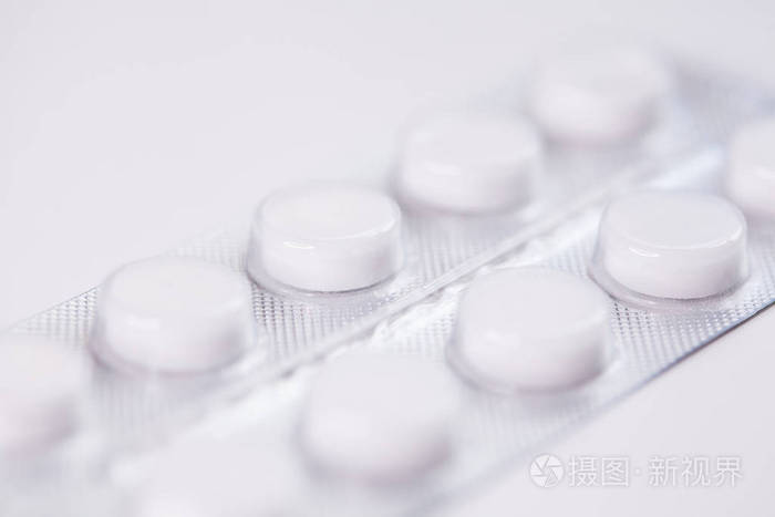 白色药片泡罩包装药丸药物宏观选择性聚焦的特写镜头