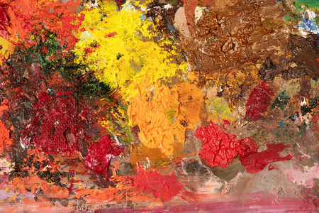 油画教学背景图片明亮的油画调色板特写.照片