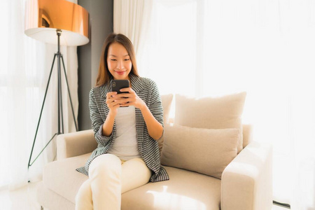 Portrait beautiful young asian women using talking mobile phone 