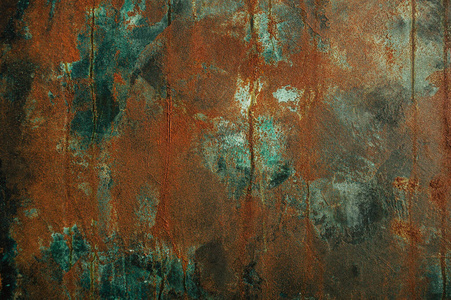 The surface of the old rusty metal with the effect of old paint 