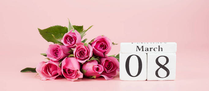 Pink Rose flower and 8th March calendar on pink background with 