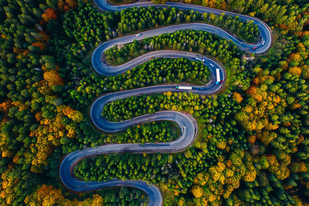 Scenic curvy road seen from a drone in autumn. Cheia, Romania. 