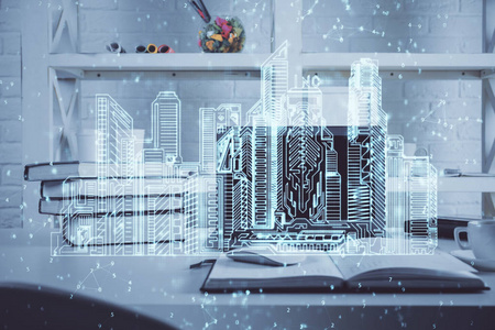桌面电脑背景办公楼和大城市建筑全息图绘制。双重曝光。智慧城市概念。