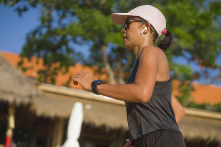 outdoors fitness lifestyle portrait of young attractive and athl