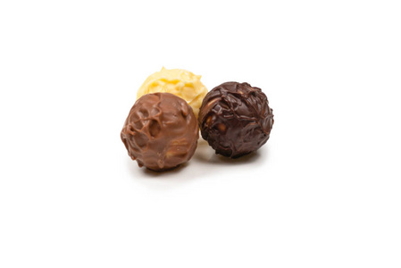 Chocolate truffle isolated on white background. 