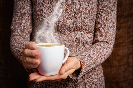 a female hands and coffee 