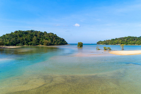 Aerial view drone shot of tropical sea with small island 