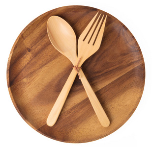 Empty wooden plate with spoon and fork isolated on white backgro