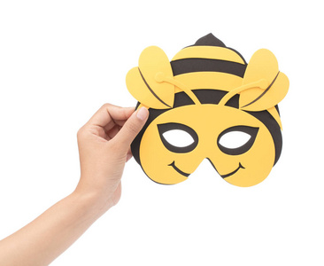 白色背景上隔离的手持蜜蜂动物狂欢节面具照片