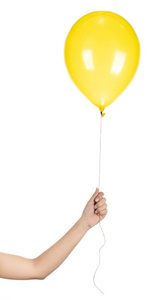 白色背景上隔离的手持黄色橡胶气球