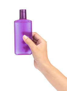 hand holding a bottle product cosmetic for skincare isolated on 