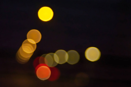 Boke streets at night. Blurred light image lights and headlights