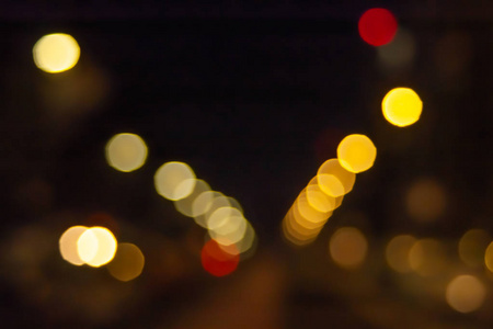 Bokeh of the road. Blurred image of the light of lanterns, traff