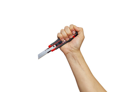 手拿切割机男人的手拿着刀.孤立的照片