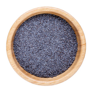 突然出现背景图罂粟籽放在白色的木盆里.俯视图.照片