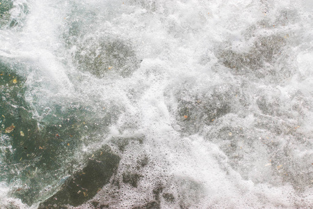 Top view texture waves, foaming and splashing in the ocean, sunn