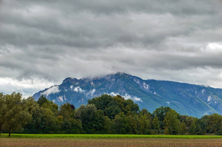 Austrian Alps under autumn dramatic sky 