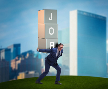 肩负重担背负工作重担的商人照片