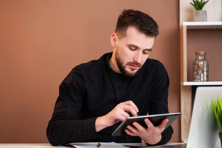 Employee working on a tablet in the 