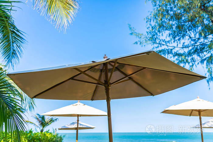 日光浴 海洋 雨伞 休息 旅游业 巴哈马 场景 美丽的 热带