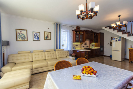 Classic bright living room with wooden furniture in the house. I