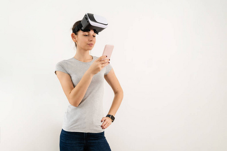 Girl in VR glasses isolated on white background. Extended realit