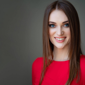 closeup portrait beautiful girl long hair in red 