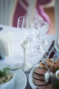 Empty glasses set in a restaurant at a Banquet.