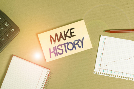 手写文字创造历史。概念意义做一些在历史过程中记住的东西纸板纸板笔记本办公室学习用品图表提醒纸。