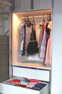 Storage in wardrobe in kids room. 