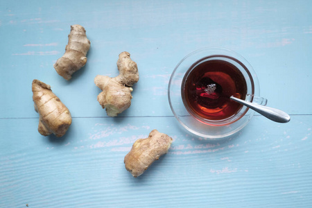 green tea with ginger on table, top view 