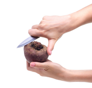 手里拿着红甜菜菜刀照片