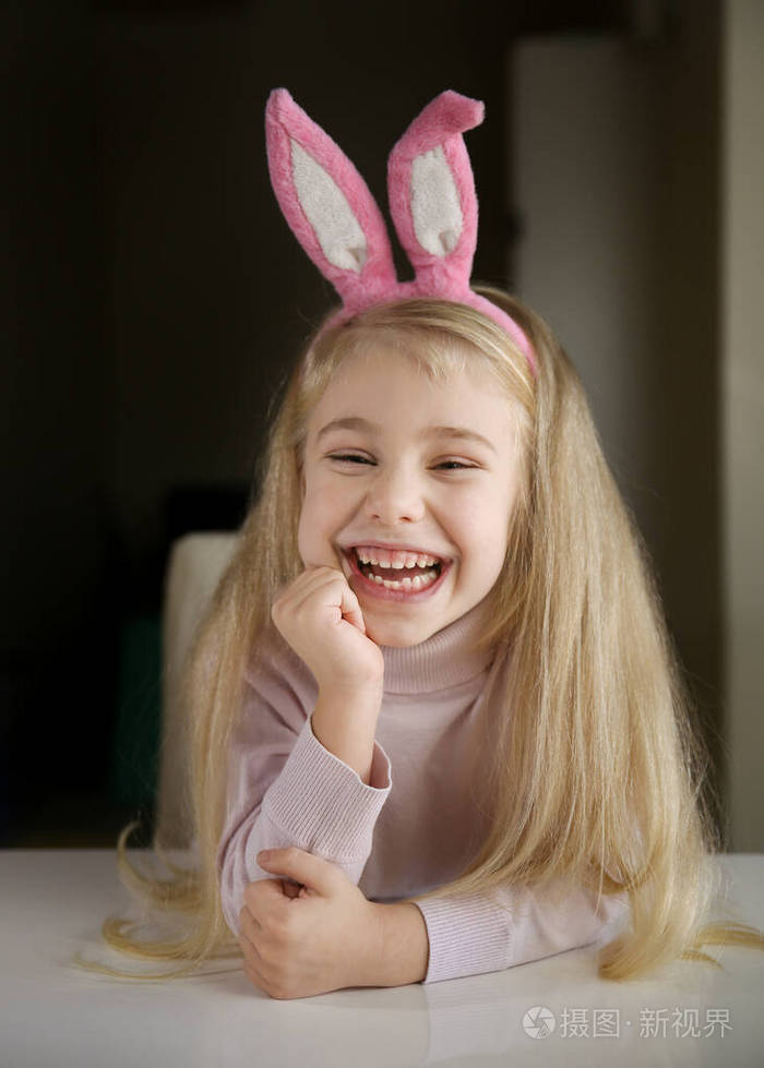 laughtinghappybabygirlwearbunnyearsoneasterday