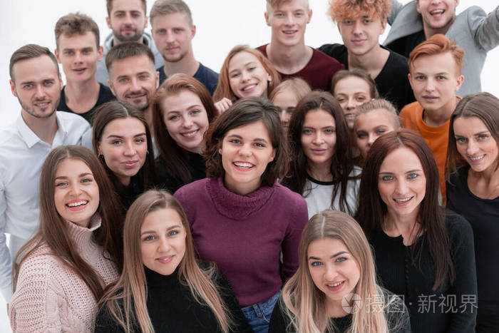 一群雄心勃勃的年轻人看着镜头照片-正版商用图片2bryac-摄图新视界
