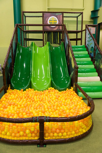 Empty childrens slides and dry pool. Childrens game entertainmen