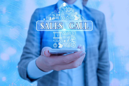 显示销售电话的概念性手写体。商业照片显示了一个公司的销售代表打电话。